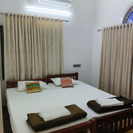 Tess Holistay Fort Kochi Habitación foto